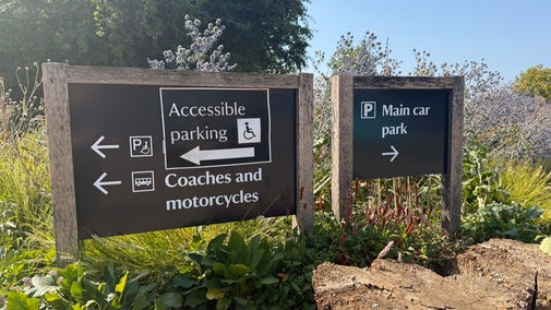 Signposts pointing to the car park at Polesden Lacey